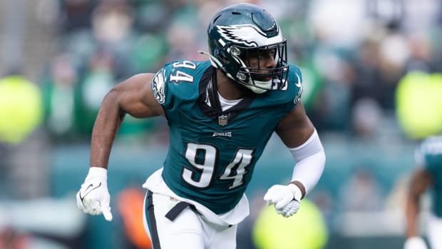 Eagles defensive end Josh Sweat rushes the passer in a game.